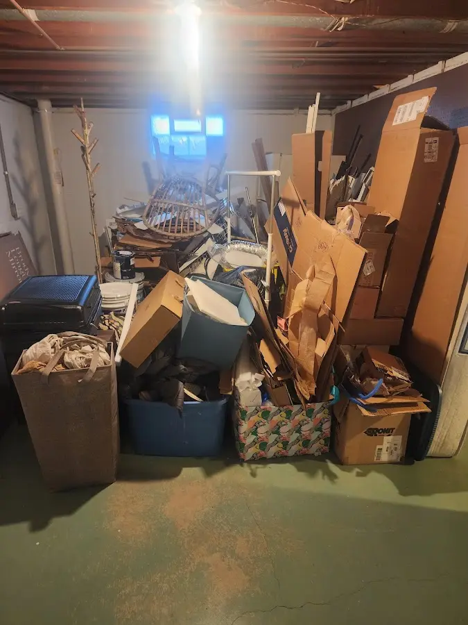 Roll-off dumpster container at job site for 6 Yard Dumpster Rental in Easton